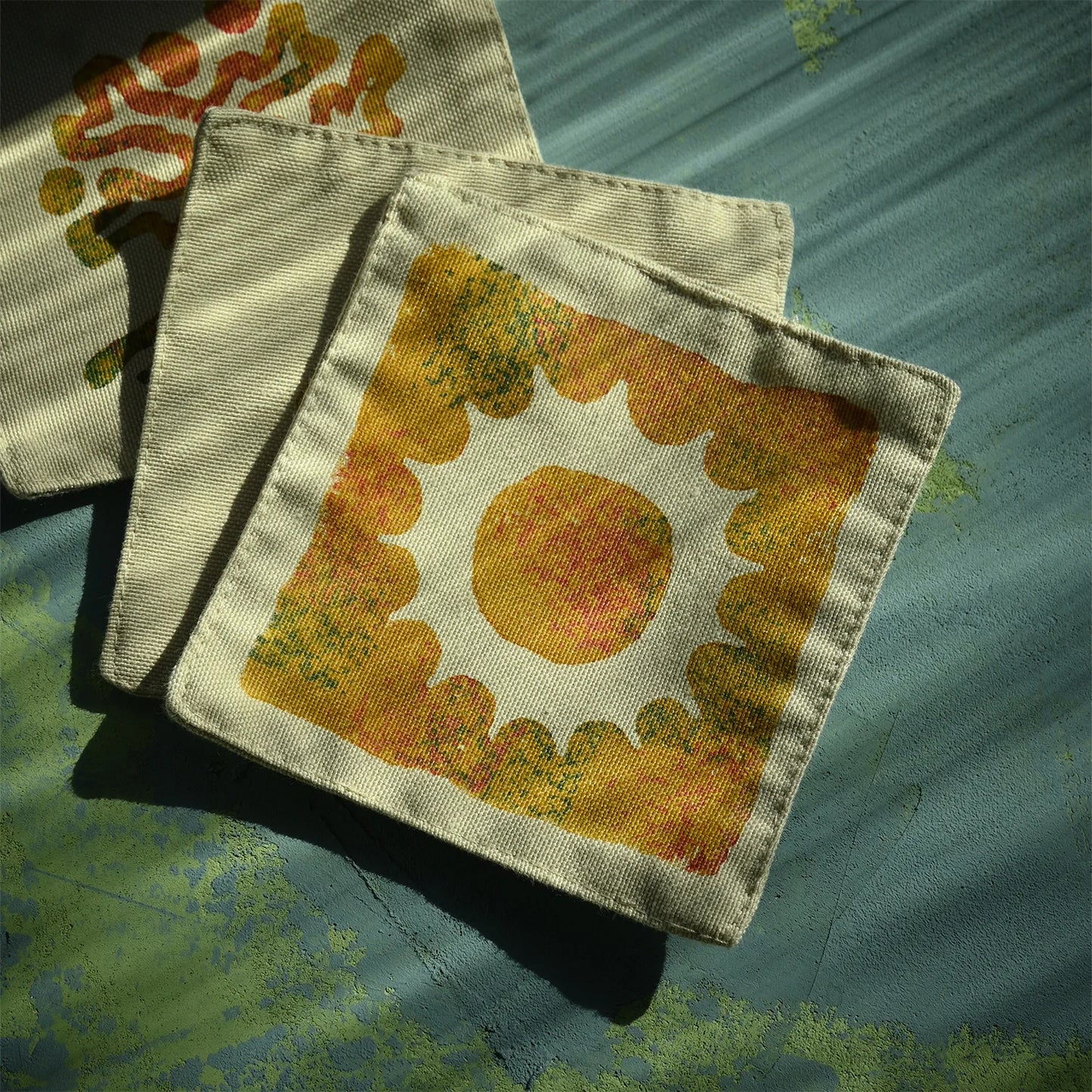 sun symbol block  printed on cup coaster made with cotton