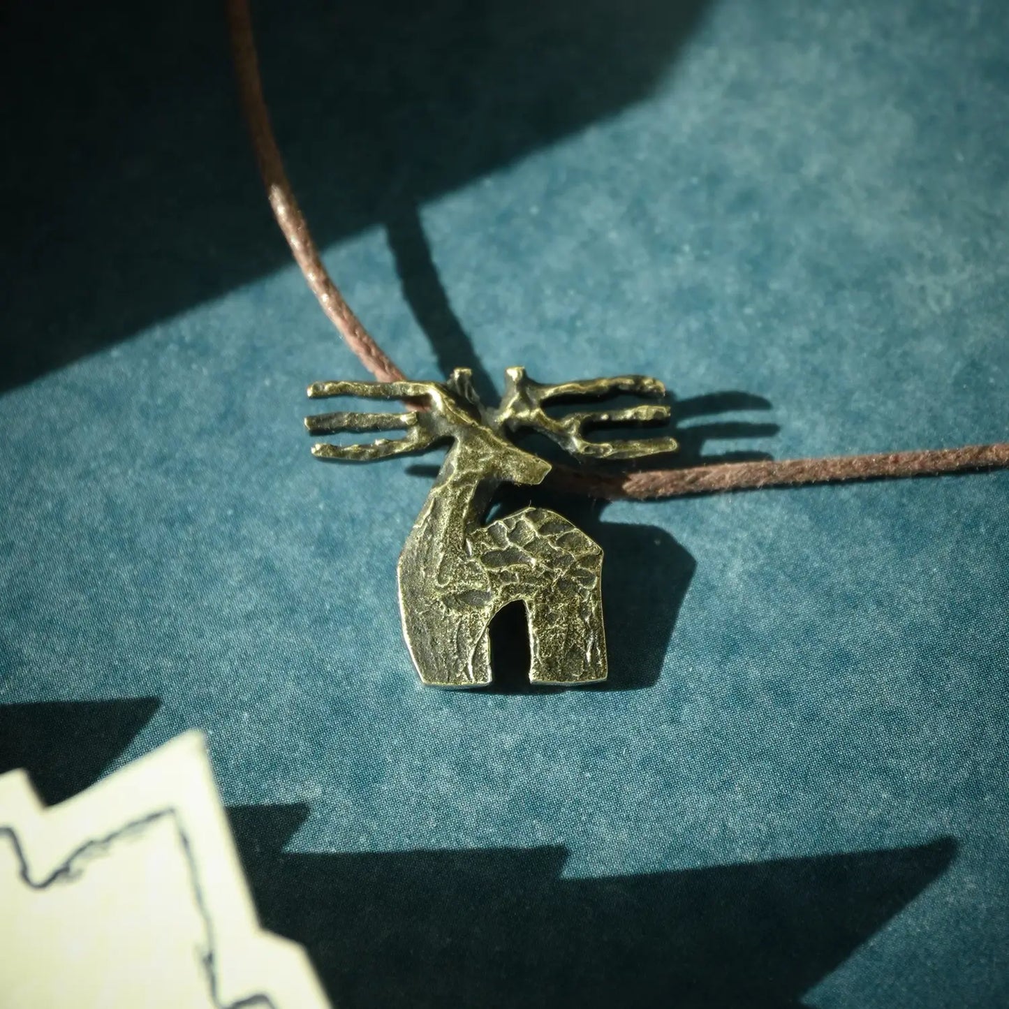 Cute brass necklace with deer motif inspired by Georgian mythology and folklore
